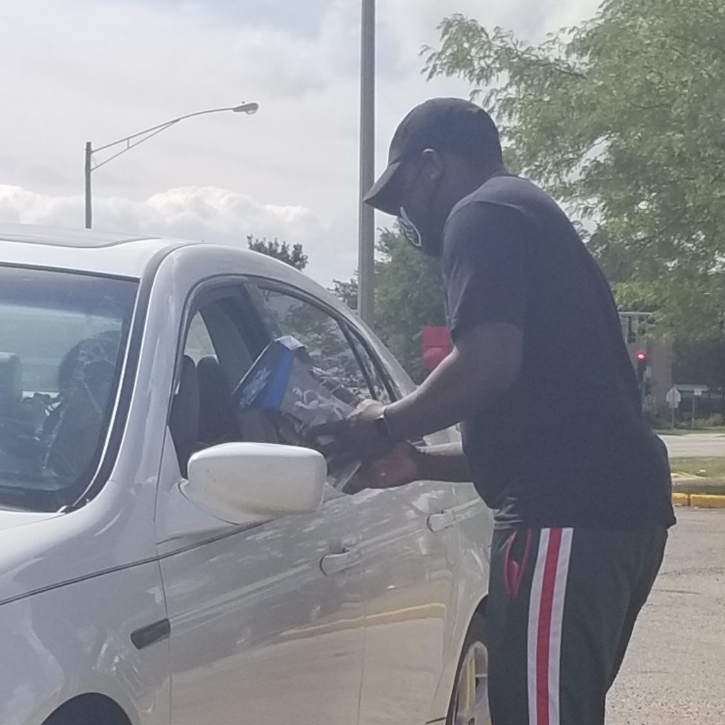 North Chicago youth flag football drive through giveaway